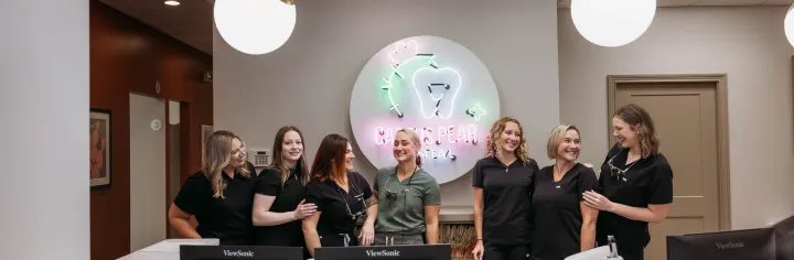 The Cactus Pear Dental team together in the office